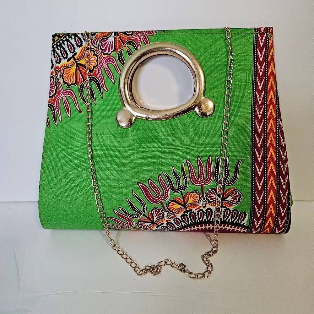 P.K Garments bright green and pink bag with gold hardware.